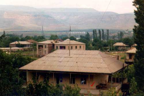 Omar's house with Kankasw mountains in the background.