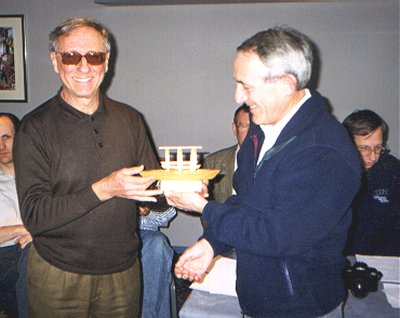 Bob Treacher BRS32525 (right), the winner of the SWL section of the UKSMG Summer Contest, receives the Treasurers Tray from Angelo, I2ADN.